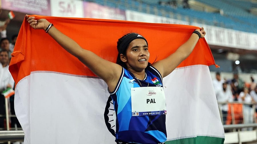 <div class="paragraphs"><p>Preeti Pal celebrates after winning silver in the women's 100m T35 final</p></div>