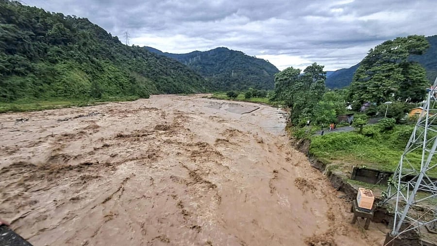 <div class="paragraphs"><p>A river in spate as heavy rainfalls trigger landslides in West Bengal.</p></div>