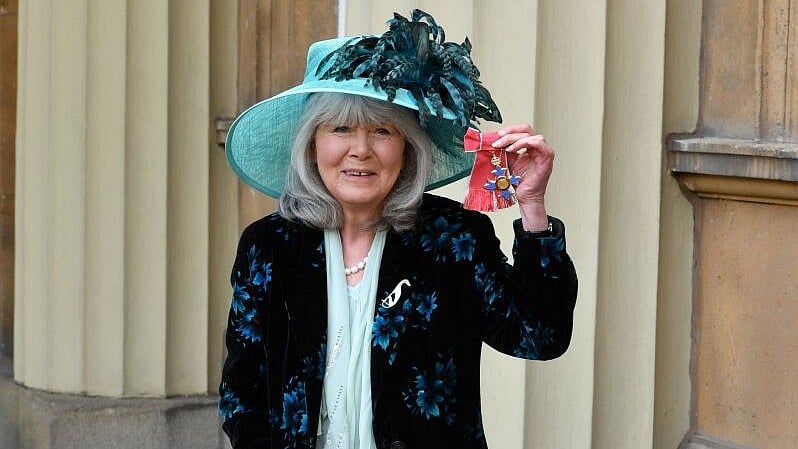 <div class="paragraphs"><p>FILE PHOTO: Author Jilly Cooper poses after she was awarded her Commander of the British Empire (CBE) medal during an Investiture ceremony at Buckingham Palace, London, Britain, March 20, 2018.</p></div>