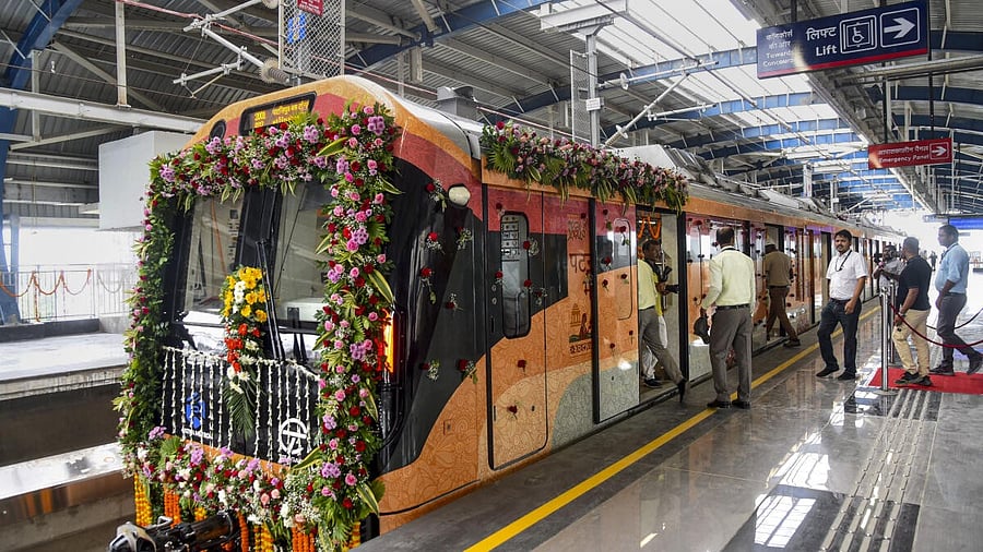 <div class="paragraphs"><p>People board a metro train during the inauguration of the first phase of the Patna Metro Rail Service, Monday, Oct. 6, 2025.</p></div>