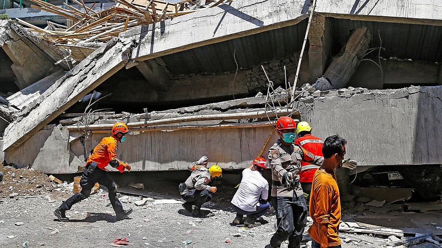 <div class="paragraphs"><p>Search and rescue operations search for victims in the rubble of a collapsed building after a hall collapsed while students were praying at the Al-Khoziny Islamic boarding school, in Sidoarjo, East Java province, Indonesia.</p></div>
