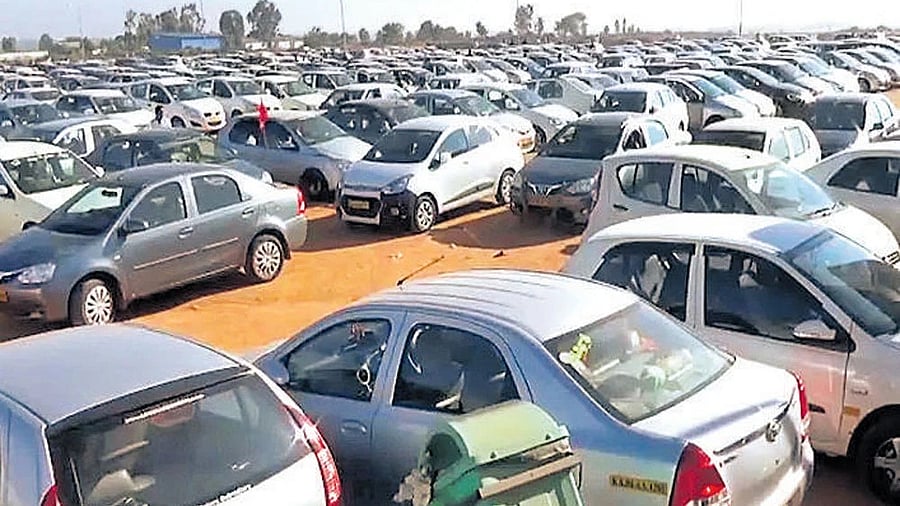<div class="paragraphs"><p>Ola and Uber cabs parked near KIA.</p></div>