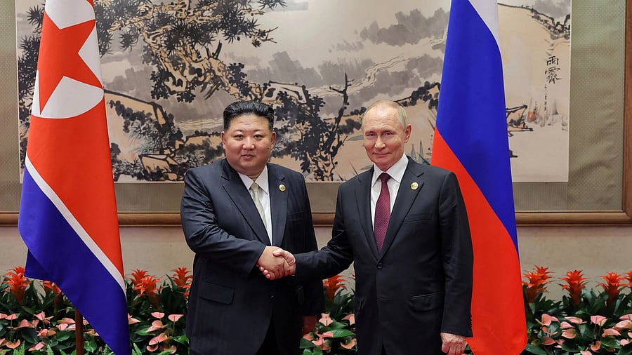 <div class="paragraphs"><p>North Korean leader Kim Jong Un shakes hands with Russian President Vladimir Putin.</p></div>