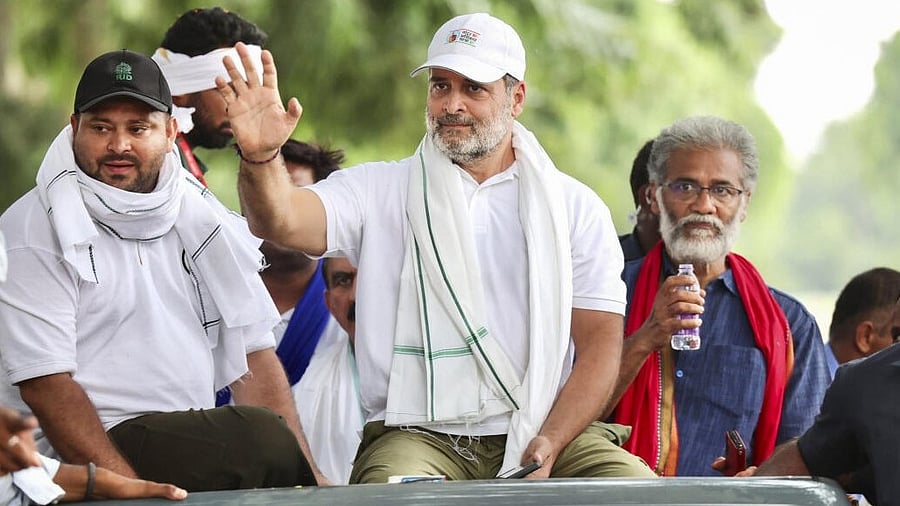 <div class="paragraphs"><p>Congress leader Rahul Gandhi with RJD leader Tejashwi Yadav and CPI (ML) Liberation general secretary Dipankar Bhattacharya.</p></div>