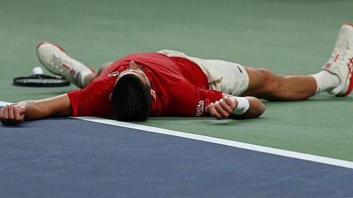 <div class="paragraphs"><p>Serbia's Novak Djokovic reacts after sustaining an injury during his round of 16 match against Spain's Jaume Munar.</p></div>
