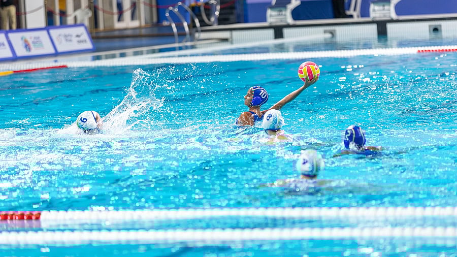 Karantaka teenager Dhruthi DK prepares to take a shot at goal against Uzbekistan during their group match in Ahmedabad on Tuesday.