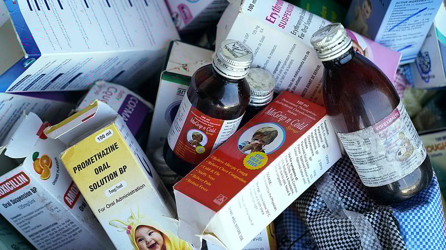 <div class="paragraphs"><p>Cough syrup bottles.&nbsp;</p></div>