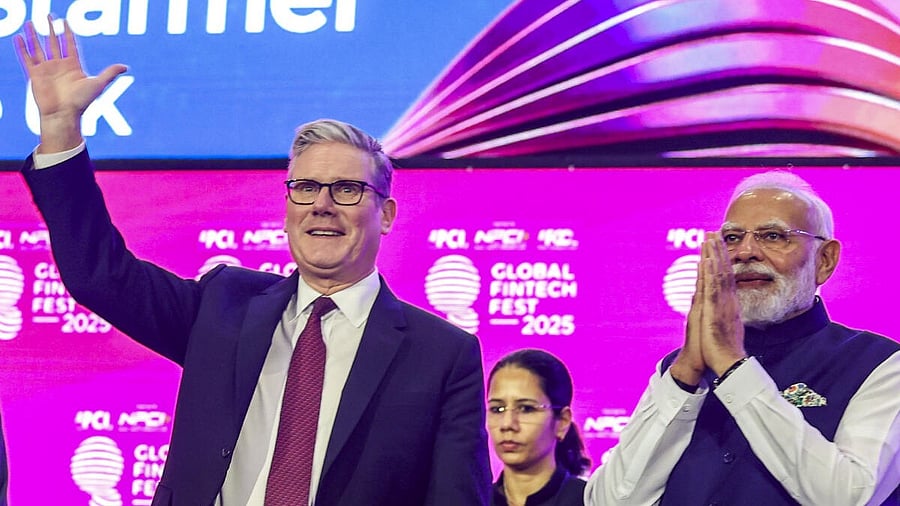 <div class="paragraphs"><p>In this image released on Oct. 9, 2025, Prime Minister Narendra Modi with his British counterpart Keir Starmer during the ‘Global Fintech Fest 2025’, at the Jio World Centre, in Mumbai, Maharashtra.</p></div>