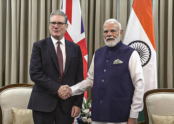 <div class="paragraphs"><p>Keir Starmer and Narendra Modi</p></div>
