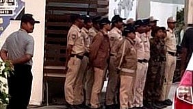<div class="paragraphs"><p>Police officers deployed outside BRS party working president KT Rama Rao's housing complex.</p></div>