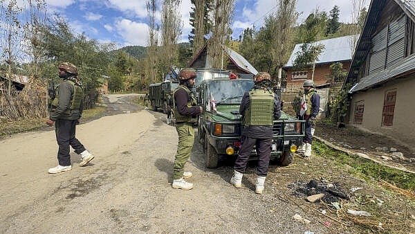 <div class="paragraphs"><p>Security personnel during a search operation to track down terrorists, at Kokernag in Anantnag district, Jammu and Kashmir.</p></div>