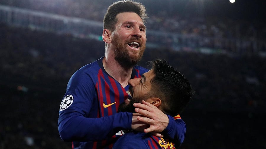 <div class="paragraphs"><p>Lionel Messi  with Luis Suarez</p></div>