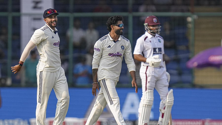 <div class="paragraphs"><p>Ravindra Jadeja celebrates after taking the wicket of West Indies' Roston Chase during the second day of the second Test cricket match between India and West Indies, at the Arun Jaitley Stadium, in New Delhi, Saturday, Oct. 11, 2025.</p></div>