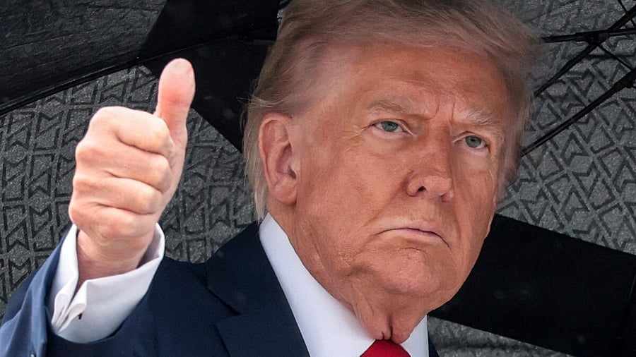 <div class="paragraphs"><p>US President Donald Trump gives a thumbs up while boarding Air Force One, as he departs for Israel, at Joint Base Andrews, Maryland, US.</p></div>