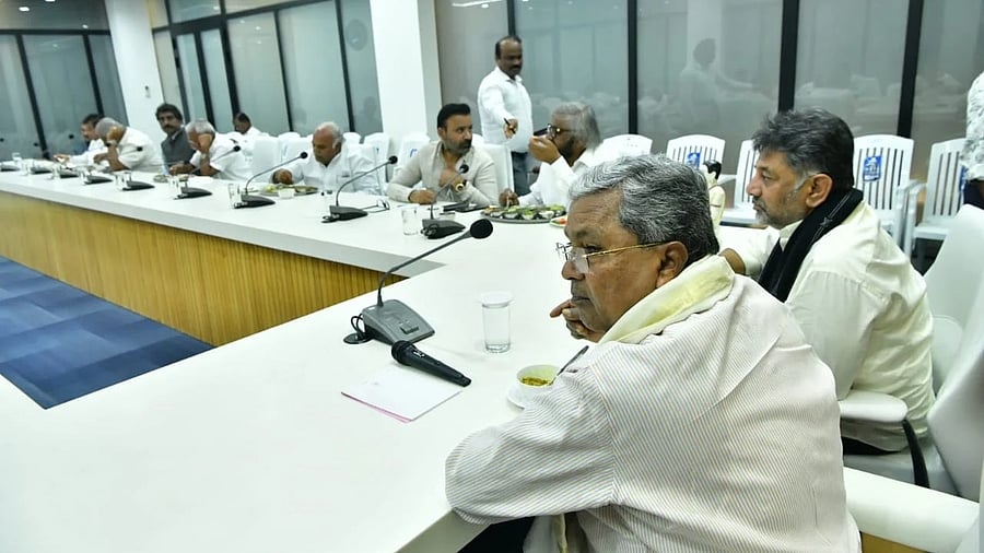 Chief Minister Siddaramaiah hosts a banquet for his Cabinet colleagues at his official residence in Bengaluru on Monday. Deputy Chief Minister D K Shivakumar  and other ministers were present. 