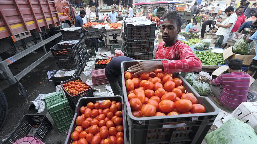 <div class="paragraphs"><p>A vendor at the Ghazipur vegetable market, in New Delhi.</p></div>