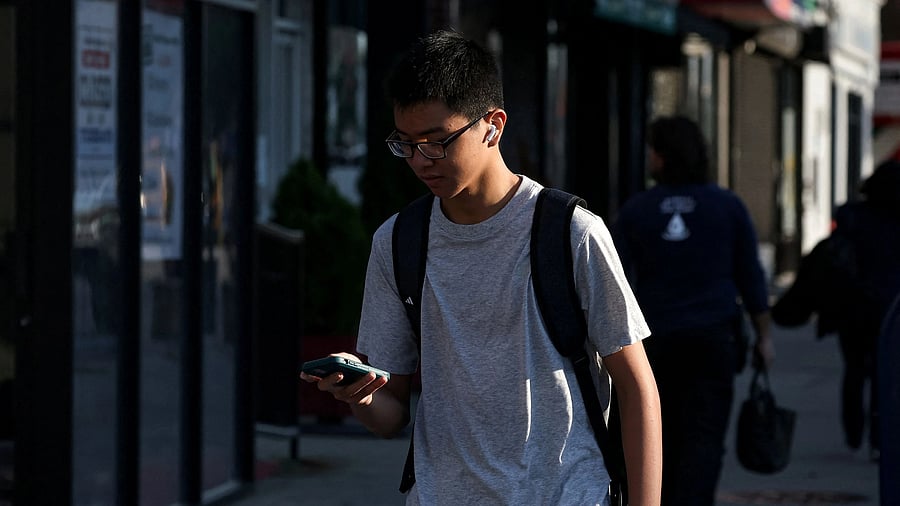 <div class="paragraphs"><p>A teen looking at his phone. (Image for representational purpose)</p></div>