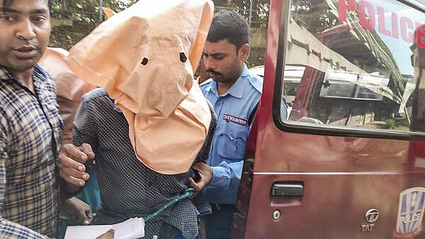 <div class="paragraphs"><p>Police officials arrest men allegedly involved in the gang rape of a second-year MBBS student from Odisha at a private medical college, in Durgapur</p></div>