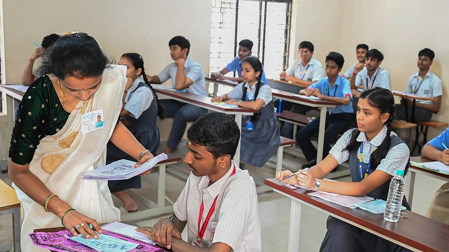 <div class="paragraphs"><p>Students writing SSLC exam at Karnataka Public School Government Girls High School Malleshwara in Bengaluru on Friday, 21st March 2025.</p></div>