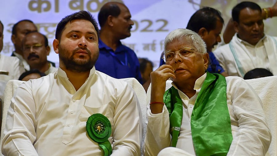 <div class="paragraphs"><p>RJD chief Lalu Prasad with son and Raghopur candidate Tejashwi Yadav</p></div>