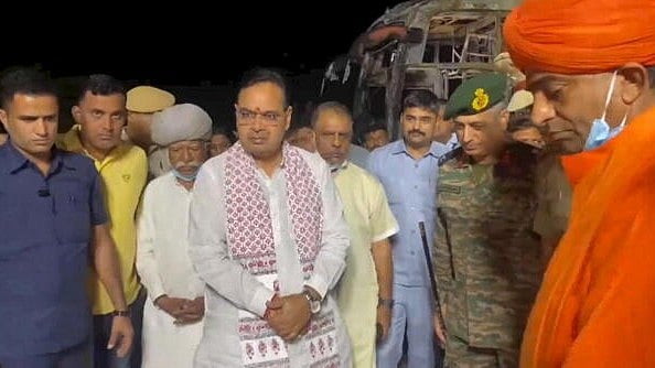 <div class="paragraphs"><p>Rajasthan Chief Minister Bhajanlal Sharma visits the spot after a bus traveling from Jaisalmer to Jodhpur caught fire, near Thaiyat village in Jaisalmer district, Rajasthan.</p></div>