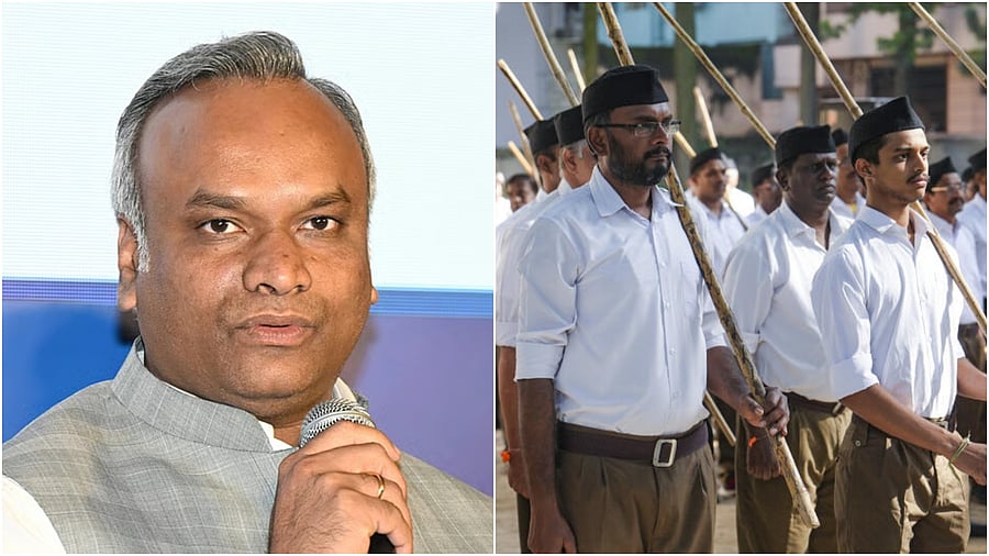 <div class="paragraphs"><p>Priyank Kharge, Minister for Information Technology and Biotechnology (L), Rashtriya Swayamsevak Sangh (RSS) volunteers. </p></div>