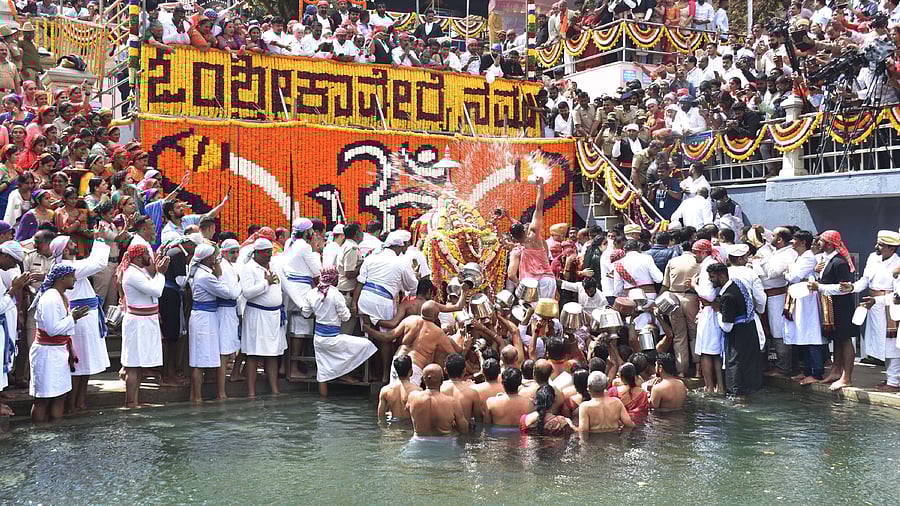 <div class="paragraphs"><p>Devotees near the sacred 'Brahmakundike' to collect the holy water on the occasion of Tula Sankramana in Talacauvery on Friday.</p></div>