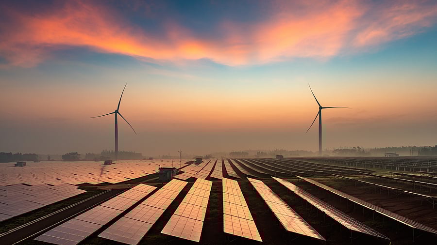 <div class="paragraphs"><p>Representative image of solar panels and windmills portraying renewable energy.</p></div>