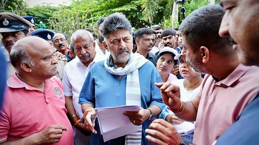 <div class="paragraphs"><p>Deputy Chief Minister D K Shivakumar interacts with citizens during his ‘Walk with Bengaluru’ programme in KR Puram on Saturday. </p></div>
