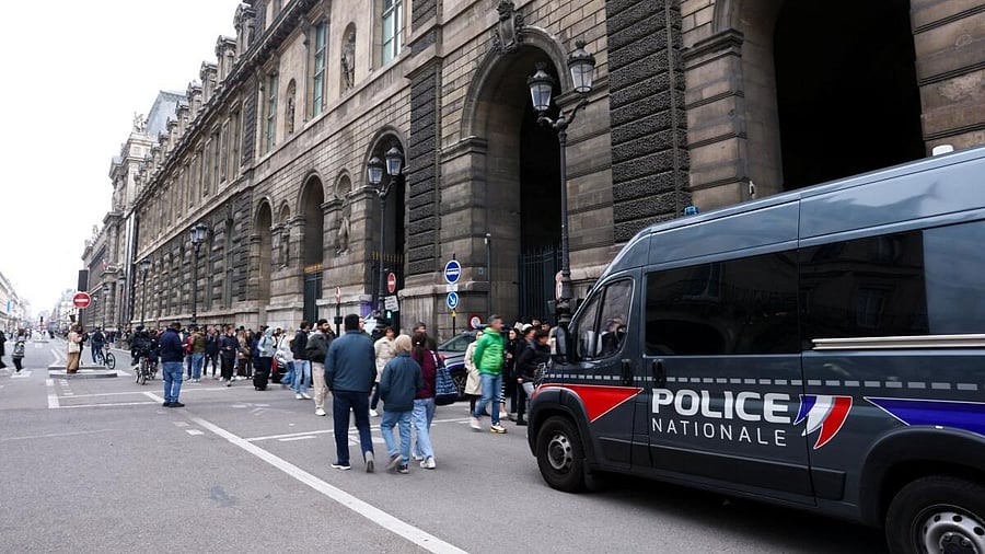 <div class="paragraphs"><p>Police vehicle stands near the entrance to the Louvre museum after reports of a robbery, in Paris, France, October 19, 2025.</p></div>