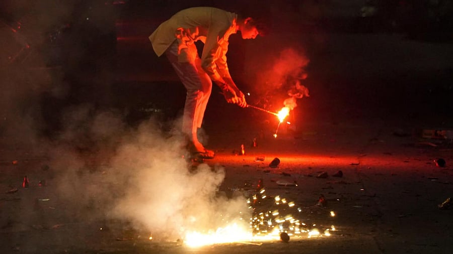 <div class="paragraphs"><p>Firecrackers being burst to celebrate Diwali. </p></div>