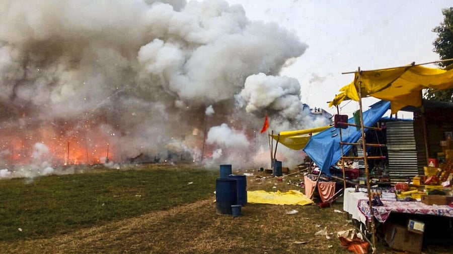 <div class="paragraphs"><p>Dark smoke and flames billow out after a fire broke out at a firecrackers market, in Fatehpur, Uttar Pradesh.</p></div>