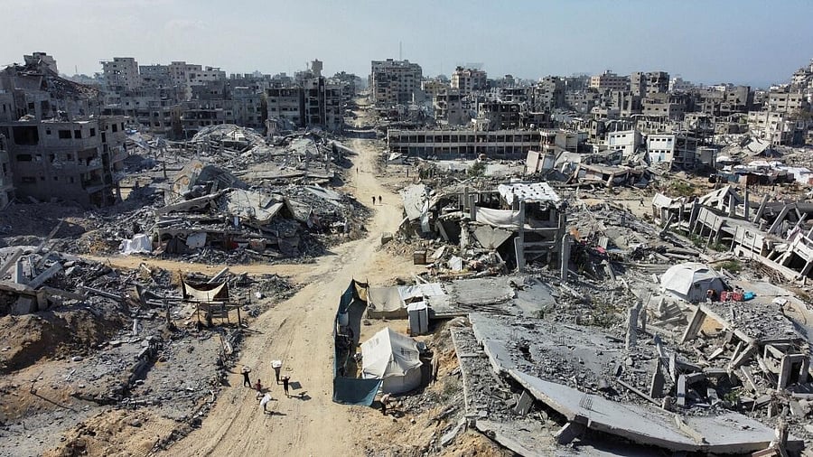 <div class="paragraphs"><p>A drone view shows the destruction in a residential neighbourhood, amid a ceasefire between Israel and Hamas in Gaza, in Gaza City.</p></div>