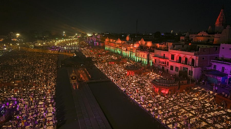 <div class="paragraphs"><p>An aerial view of ‘diyas’, earthen lamps, lit during ‘Deepotsav 2025’ celebration on the eve of the ‘Diwali’ festival, at Ram Ki Paidi on the banks of the Saryu river, in Ayodhya, Uttar Pradesh, Sunday, Oct. 19, 2025.</p></div>