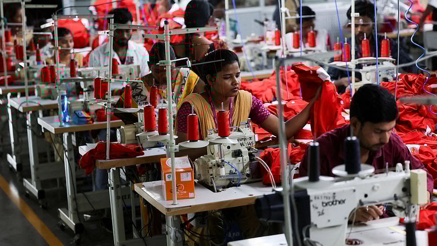 <div class="paragraphs"><p>People work at a garment factory in Tiruppur, in the Southern state of Tamil Nadu, India, April 23, 2025. </p></div>