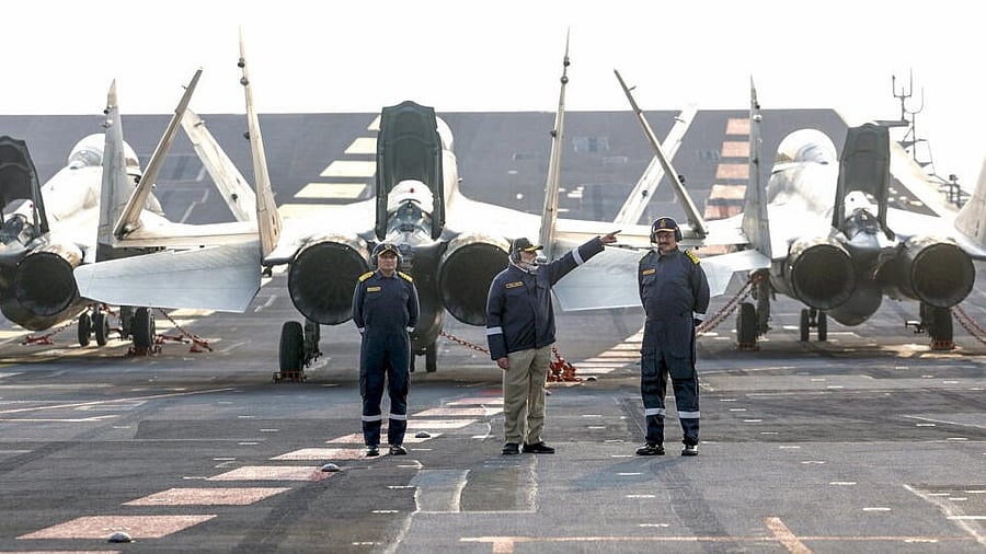<div class="paragraphs"><p>Prime Minister Narendra Modi interacts with Navy officials on the flight deck of INS Vikrant, with MiG-29 fighter jets in the background, during his visit to naval personnel on the occasion of Diwali, off the coast of Goa and Karwar.</p></div>