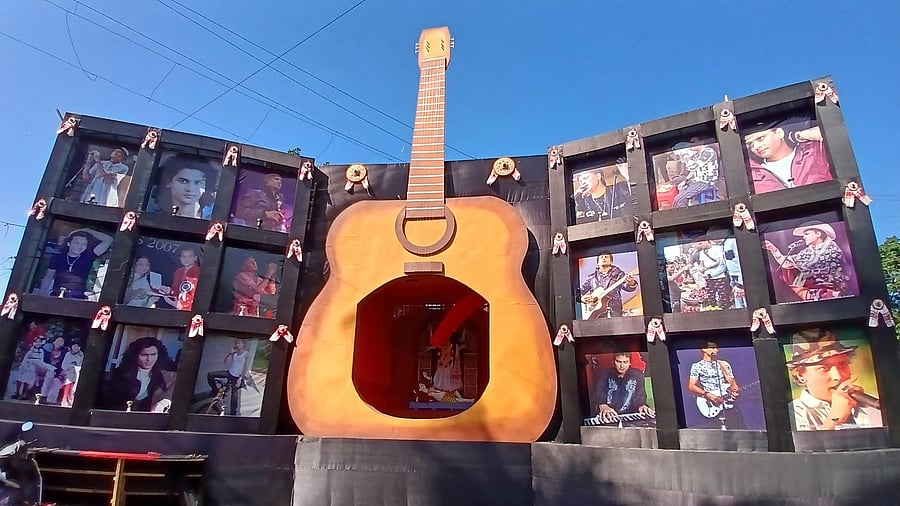 <div class="paragraphs"><p> A Kali Puja pandal displaying Zubeen Garg's musical journey, in Maligaon in Guwahati</p></div>