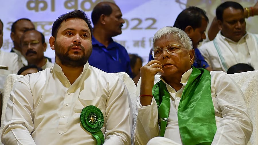 <div class="paragraphs"><p> Lalu Prasad with son Tejashwi Yadav.</p></div>