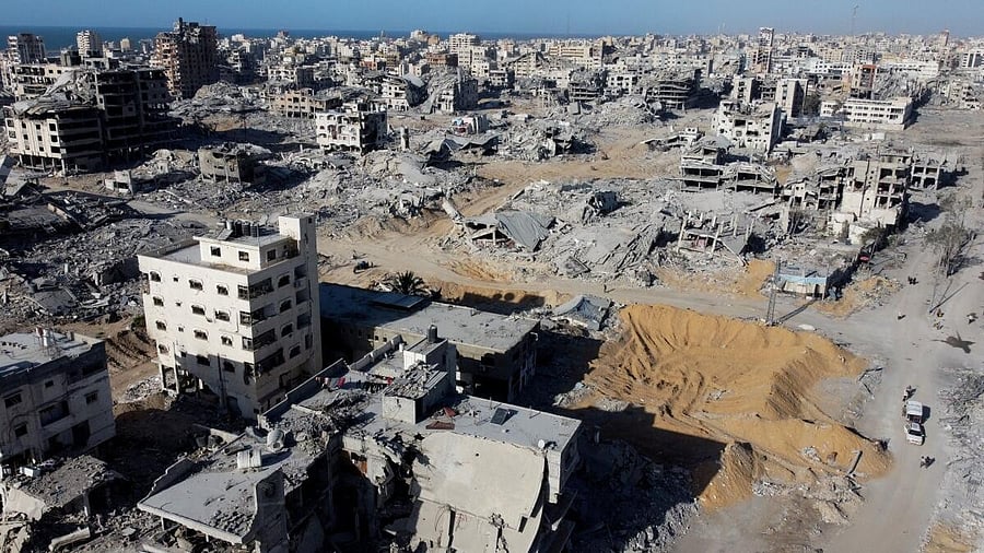 <div class="paragraphs"><p>A drone view shows the destruction in a residential neighborhood, after the withdrawal of the Israeli forces from the area, amid a ceasefire between Israel and Hamas in Gaza, in Gaza City.</p></div>