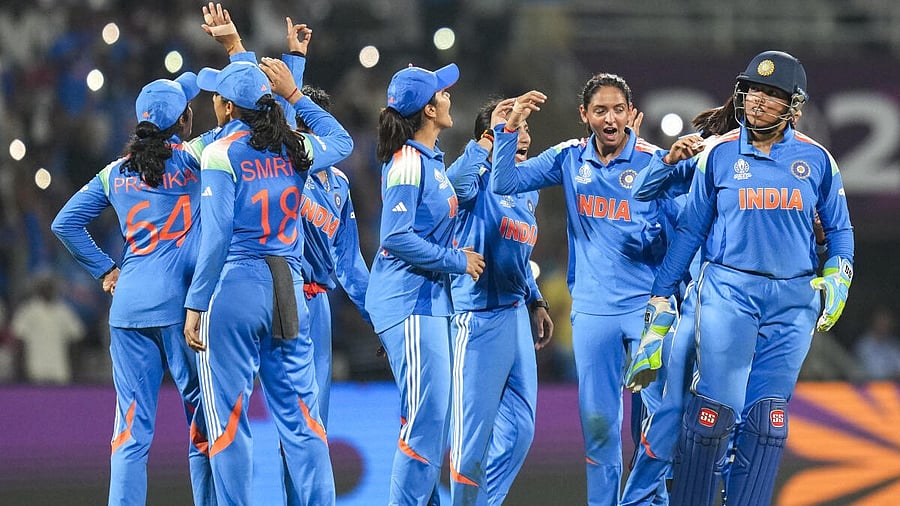 <div class="paragraphs"><p>India's players celebrate the wicket of New Zealand’s Amelia Kerr during an ICC Women's World Cup ODI cricket match between India Women and New Zealand Women, at the DY Patil Stadium, in Navi Mumbai.</p></div>