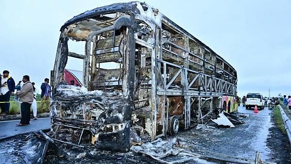 <div class="paragraphs"><p>Charred remains of the private bus that caught fire after a collision with a two-wheeler in Kurnool. </p></div>