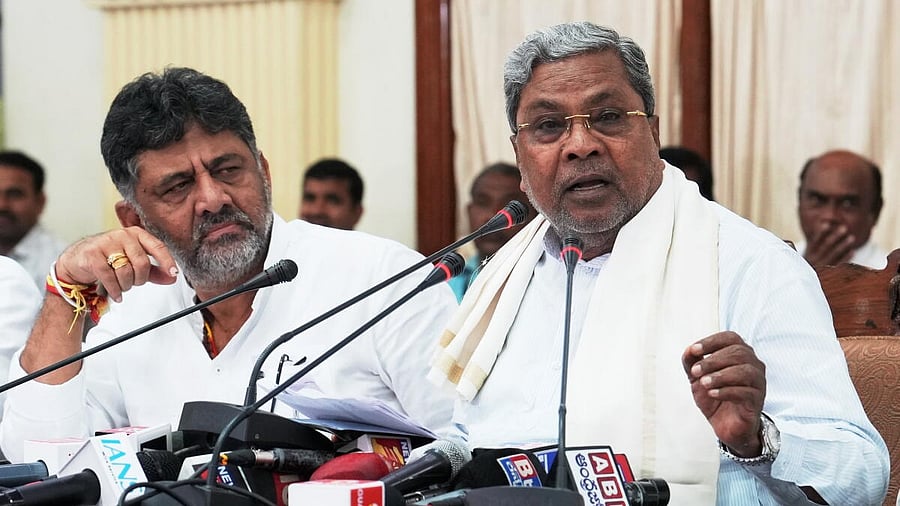 <div class="paragraphs"><p>Karnataka Chief Minister Siddaramaiah (right) with his deputy D K Shivakumar.</p></div>