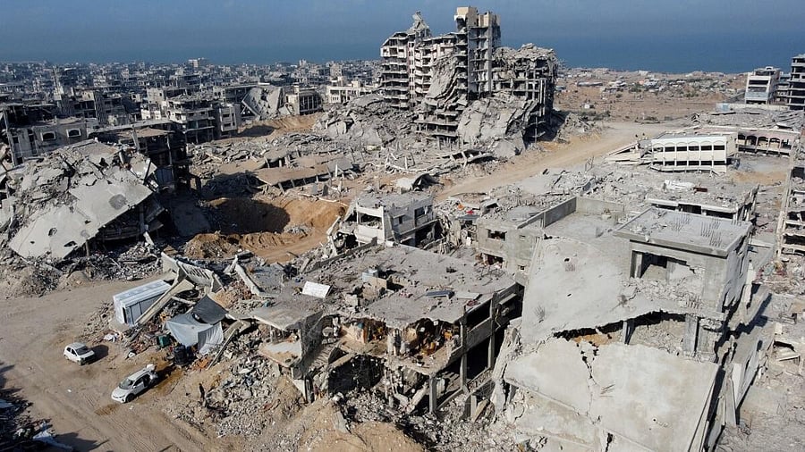 <div class="paragraphs"><p>A drone view shows the destruction in a residential neighborhood, after the withdrawal of the Israeli forces from the area, amid a ceasefire between Israel and Hamas in Gaza, in Gaza City.</p></div>