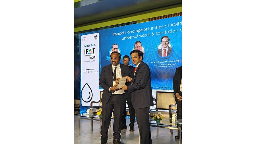 <div class="paragraphs"><p>Dr. Ram Prasath Manohar, IAS, Chairman, BWSSB, receives the official membership from a representative of the Smart Water Networks Forum (SWAN) at IFAT India 2025.</p></div>