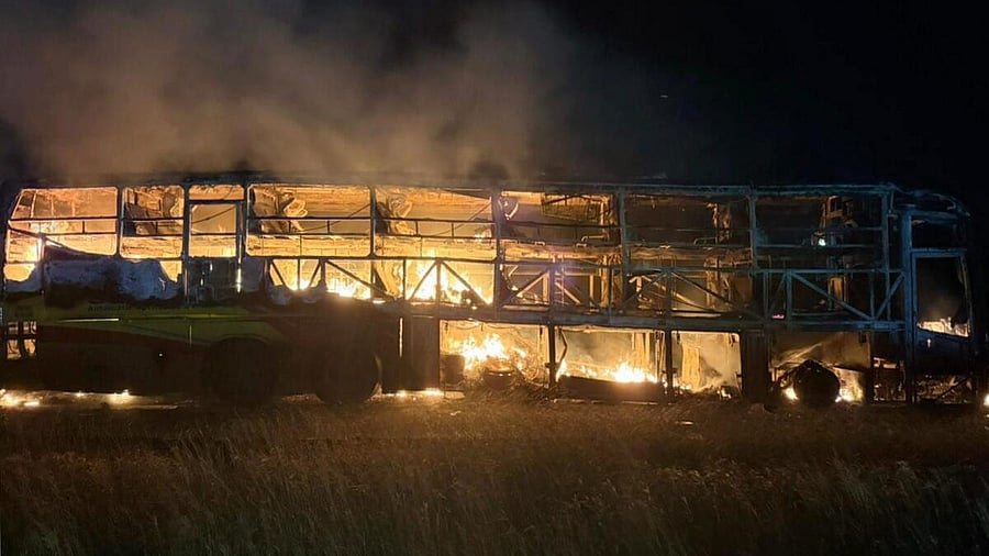 <div class="paragraphs"><p>A Hyderabad-bound private bus after it caught fire following a collision with a two-wheeler, near Chinnatekur in Kurnool district</p></div>
