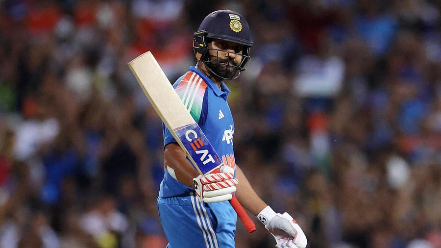 <div class="paragraphs"><p>Rohit Sharma celebrates after reaching his century against Australia in the Sydney ODI. </p></div>