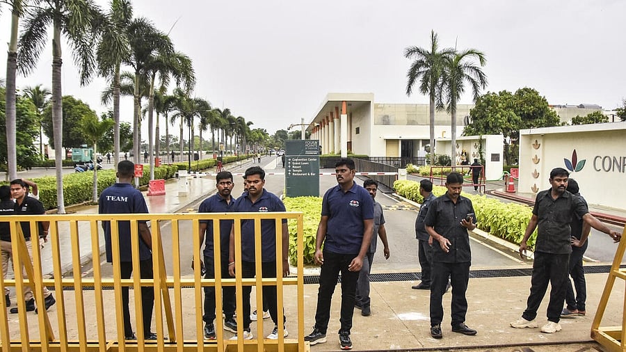 <div class="paragraphs"><p>Security personnel stand guard outside a resort where actor-politician Vijay is meeting the families of the Karur stampede victims, in Mahabalipuram</p></div>