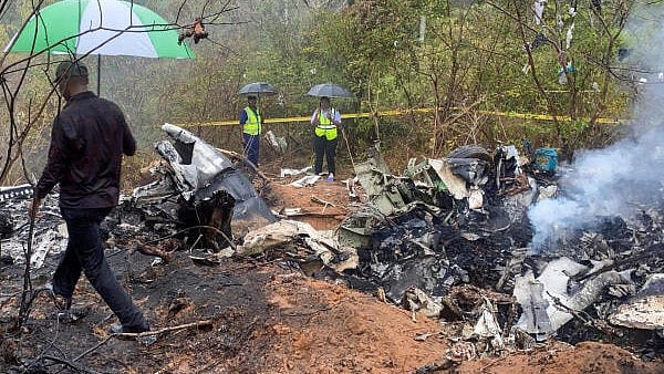 <div class="paragraphs"><p>Security officials secure the wreckage of the aircraft 5Y-CCA operated by Mombasa Air Services, which crashed in Kwale County</p></div>