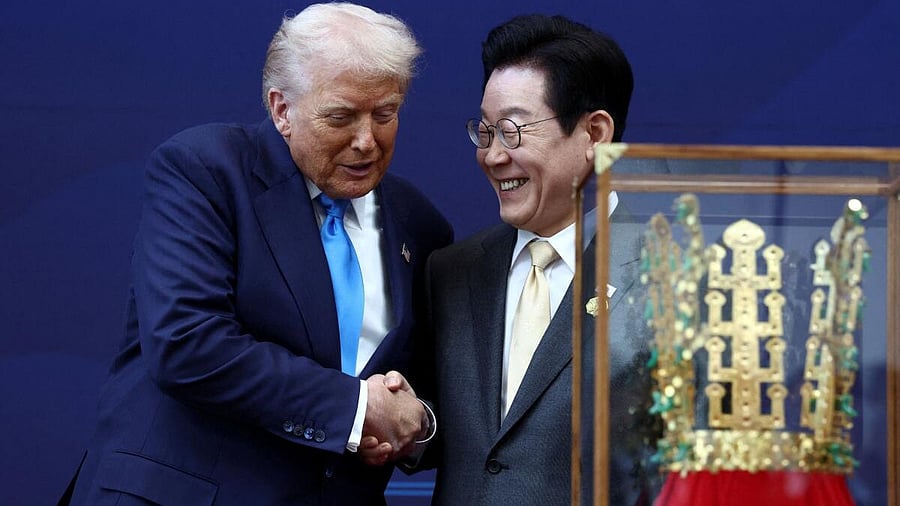 <div class="paragraphs"><p>US President Donald Trump is presented with the "Grand Order of Mugunghwa" (not pictured) and a replica gold crown during a meeting with South Korean President Lee Jae Myung on the sidelines of the Asia-Pacific Economic Cooperation (APEC) leaders' summit in Gyeongju, South Korea.</p></div>