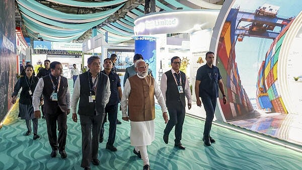 <div class="paragraphs"><p>Prime Minister Narendra Modi visits a stall at an exhibition during the Maritime Leaders Conclave at the India Maritime Week 2025 event.</p></div>
